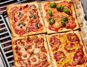 Recept: bonte familiepizza met 4 soorten beleg