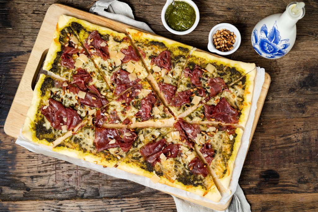 hoelang moet een pizza in de oven